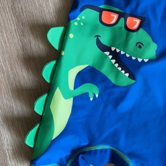 Carter’s Short Sleeve Dinosaur RashGuard Romper - Picture 2 of 4